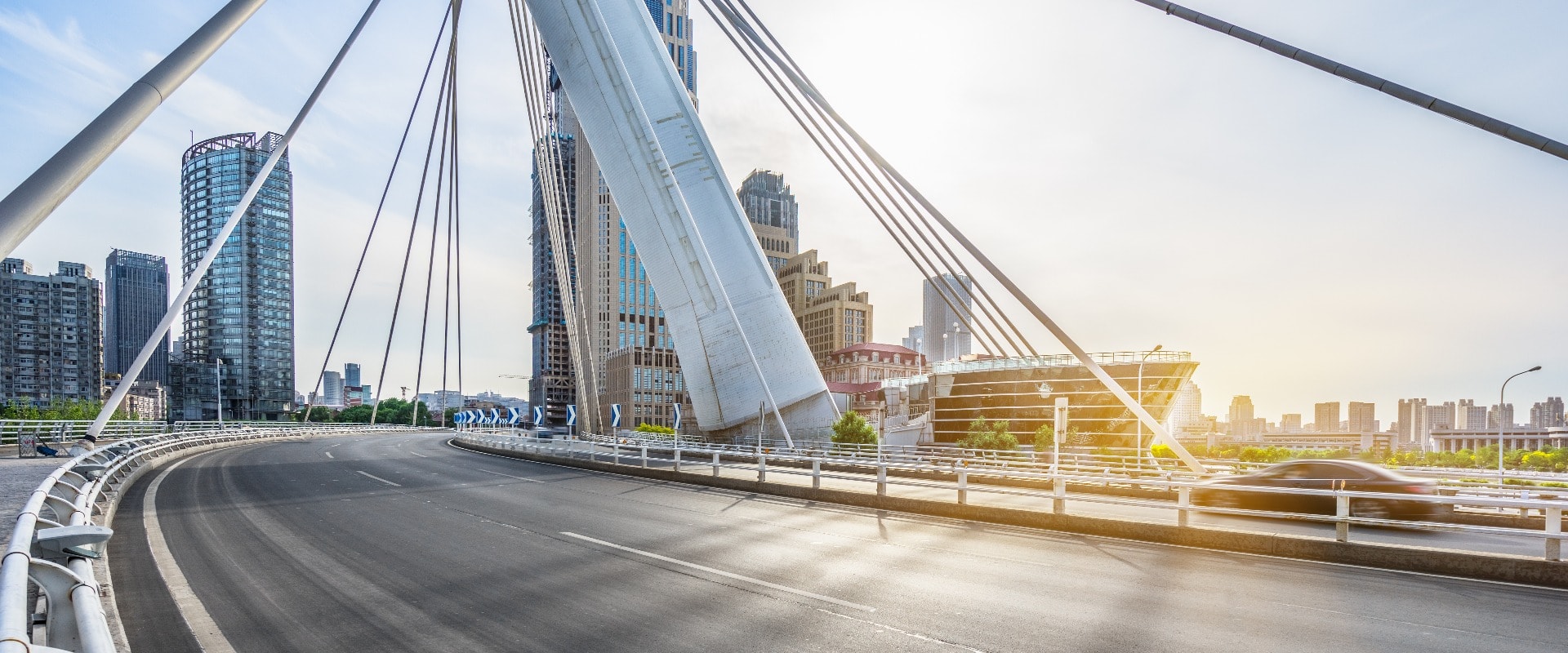 modern buildings with empty road under blue sky,tianjin china.
